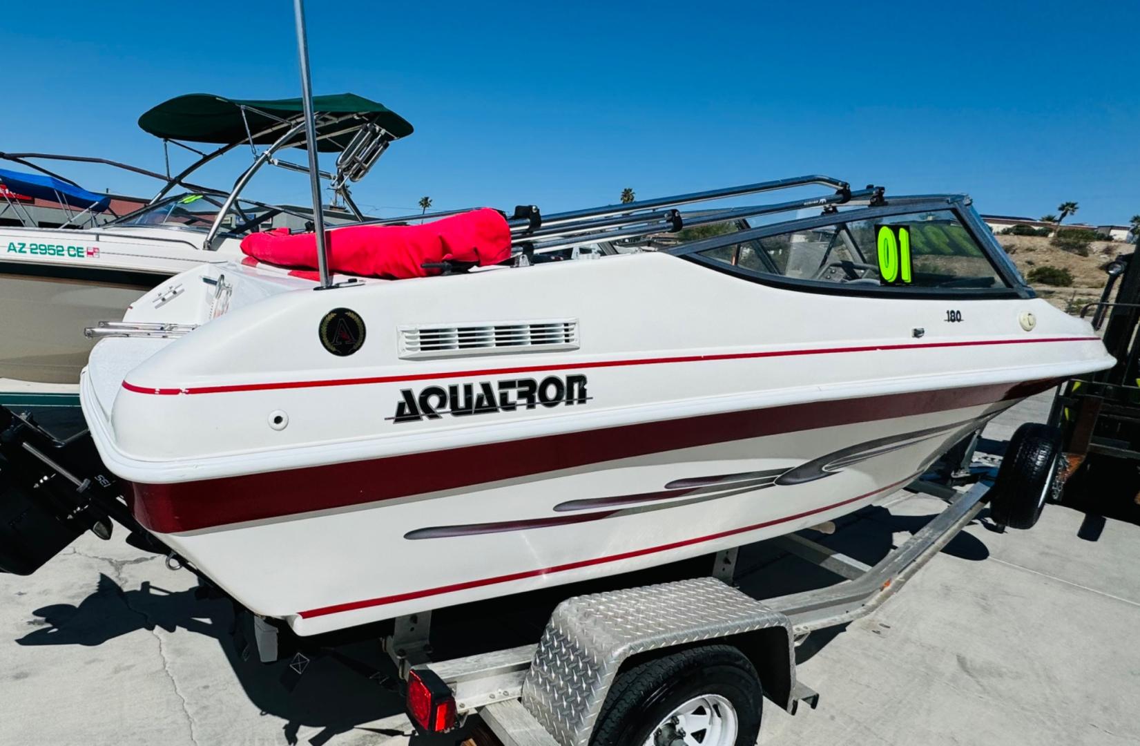 2001 White /white/red Aquatron 180 , located at 2190 Hwy 95, Bullhead City, AZ, 86442, (928) 704-0060, 0.000000, 0.000000 - On consignment this 2001 Aquatron 180. 3.0 engine. 18ft in length. nice bimini top . interior has some damage. price reduced. Runs great. - Photo#3